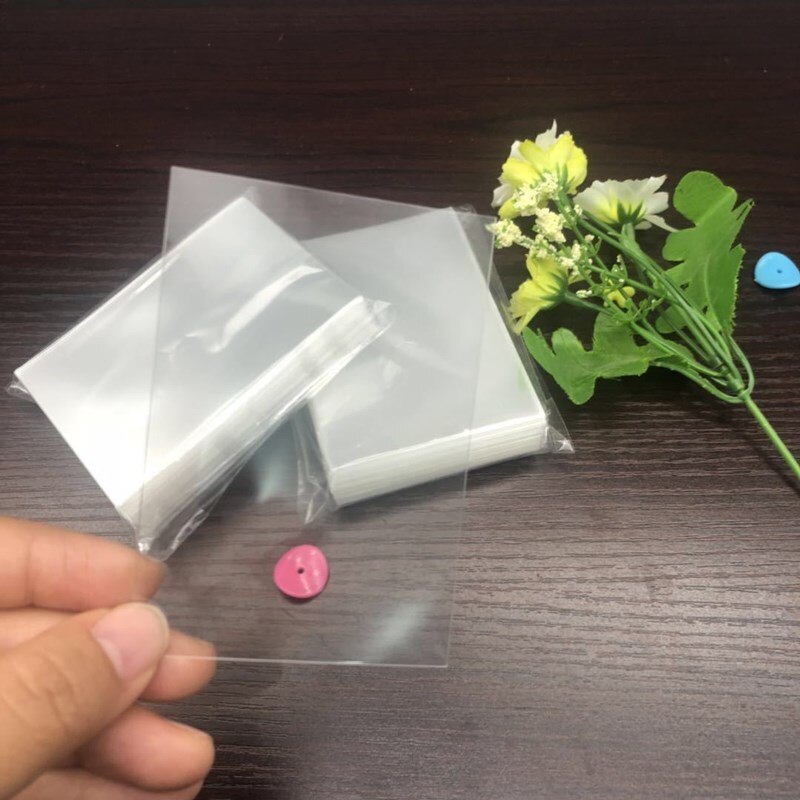 100PCS/Pack Board Game Cards Outer Protector Gaming Trading Card Holder Sleeves for Football Basketball Sports Card