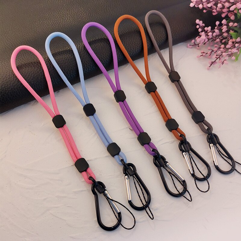 Cordón ajustable para teléfono móvil, cuerda corta tejida a mano, colgante para muñeca, funda universal antipérdida que combina con todo