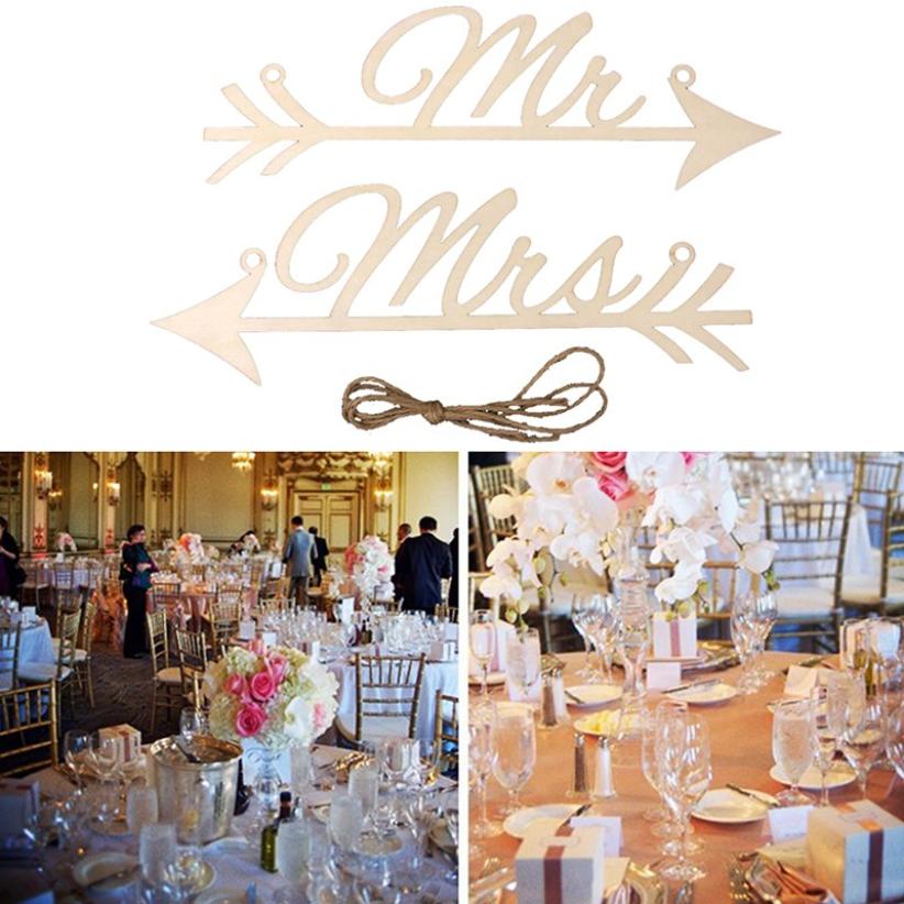 home decor wedding sign in wooden wedding letters and arrow signs indicating wedding party signage for clients