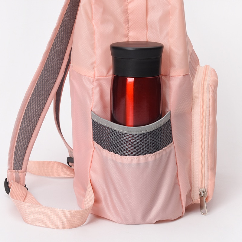 Mochila de viaje plegable para uso en piel, bolsa de escuela portátil de almacenamiento, venta directa de fábrica