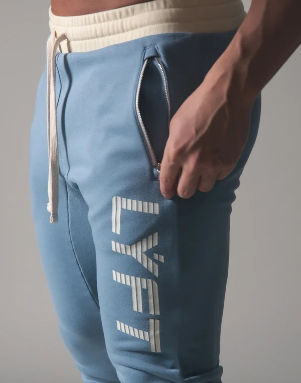 Miesten verkkarit, fitness-, kehonrakennus- ja vapaa-ajan housut, printtihousut, collegehousut, puuvillaiset verkkarit, kapea istuvuus, streetwear-housut
