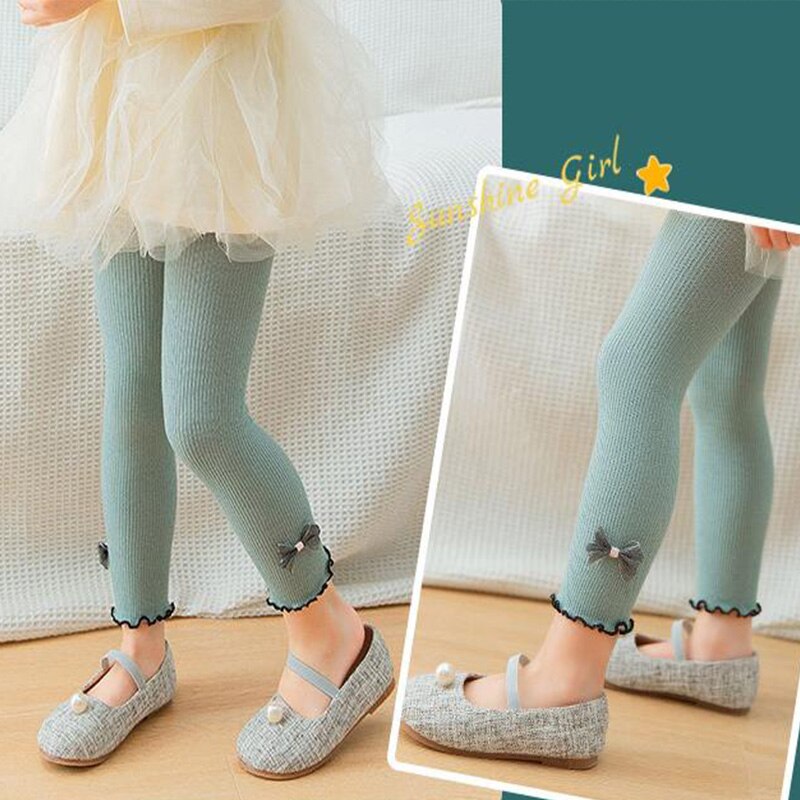 Dziewczęce legginsy dziecięce spodnie dla dziewczynek dziecięce legginsy dziecięce cukierki kolorowe spodnie kokarda bawełniana oddychająca wiosna jesień