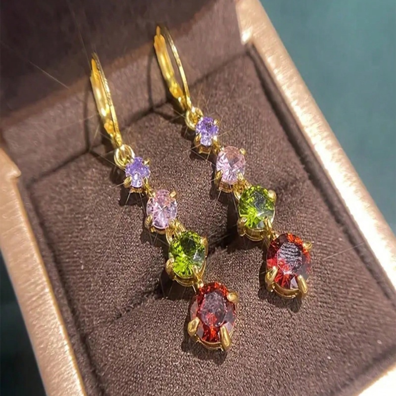 Prachtige lange oorbellen met blad-/bloemontwerp voor dames verspreid met fonkelende zirkonia mode-huwelijkssieraden