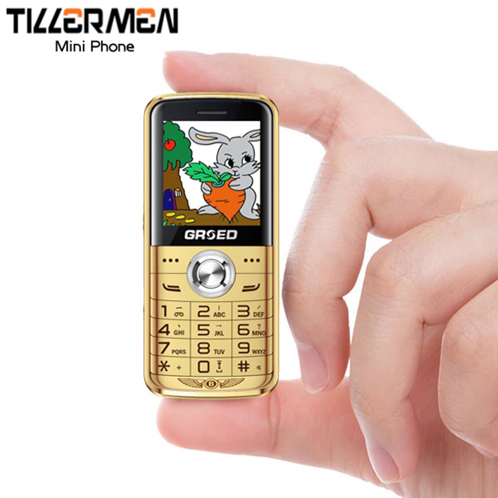 Günstigstes Mini Telefon Funktion Telefon Fackel Lange Standby MP3 Bluetooth GSM 900/1800 MHZ 0.3MP Dual SIM Karte Russische sprache tastatur