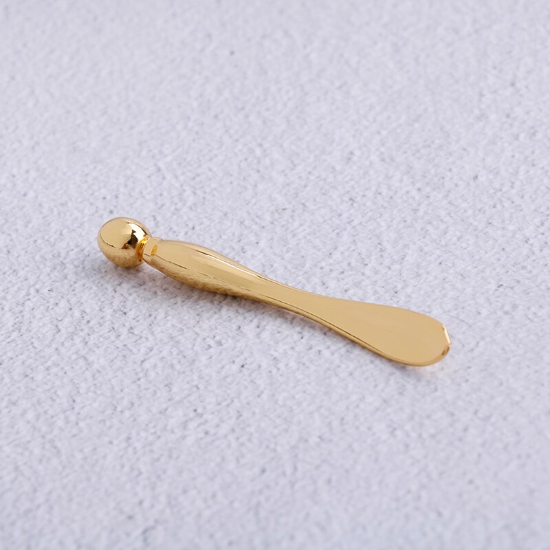 Øjenmassage Stick - Ansigt Løft - Skønhedsværktøj til Mørke Rande - Opdelt Scoop: Guld
