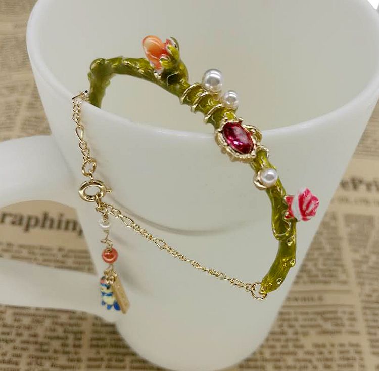 flower ornaments European and beautiful women's bracelet enamel color glaze rose flower bird pendant bracelet