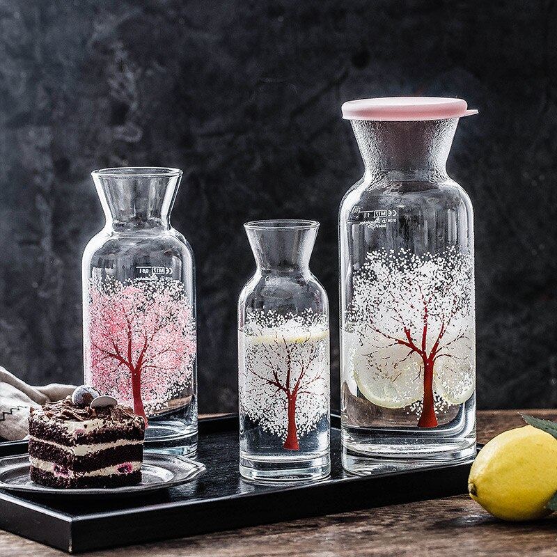 Taza de agua de flor de cerezo que cambia de Color de vidrio nórdico, botella de jugo de leche creativa resistente al calor, taza de té transparente, artículos para beber