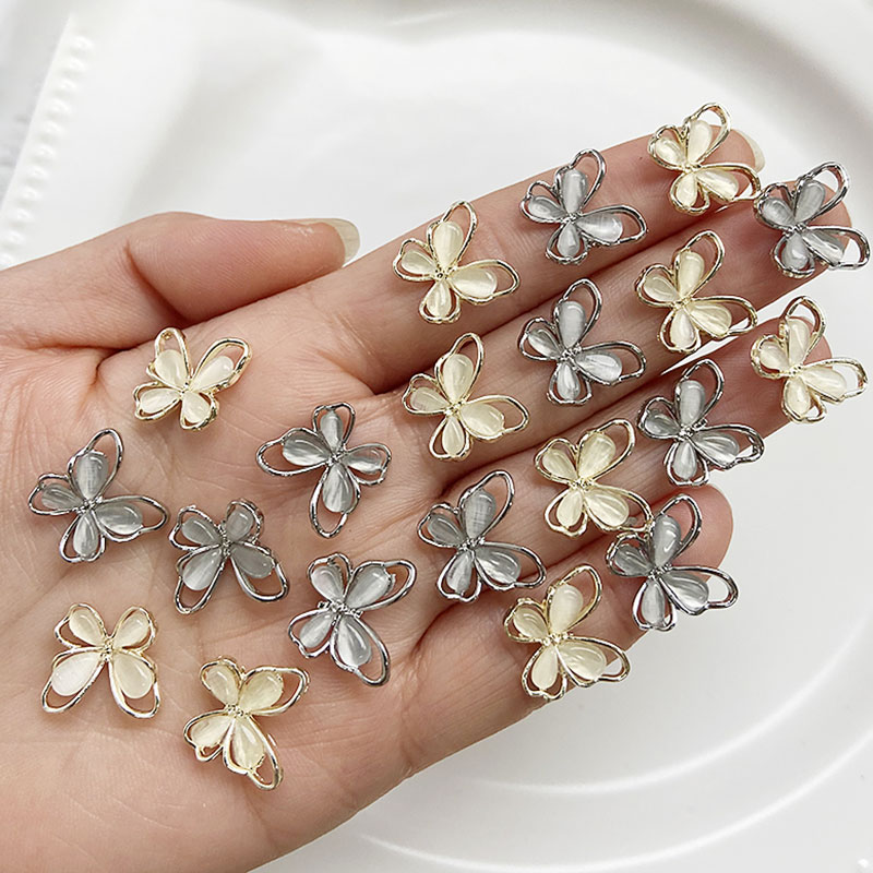 10Pcs Siver White Crystal Butterfly Nail Charms 3D Hollow Cat's Eye Alloy Zircon Nail Gems Luxury Diamond Butterfly Nail Charms