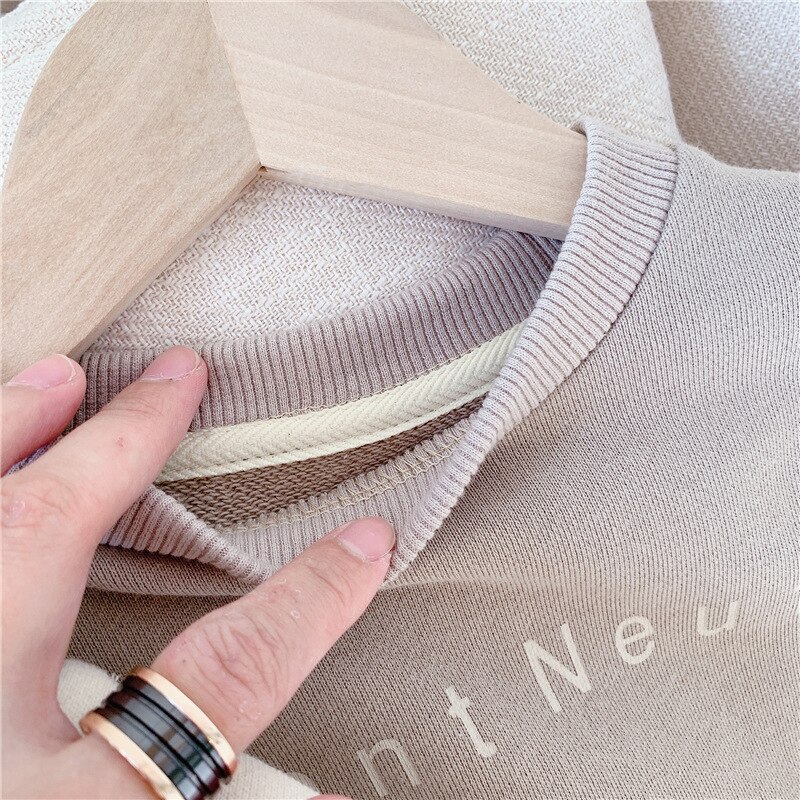 vêtements pour enfants automne nouvelle fille coréen revers pull à manches longues en vrac