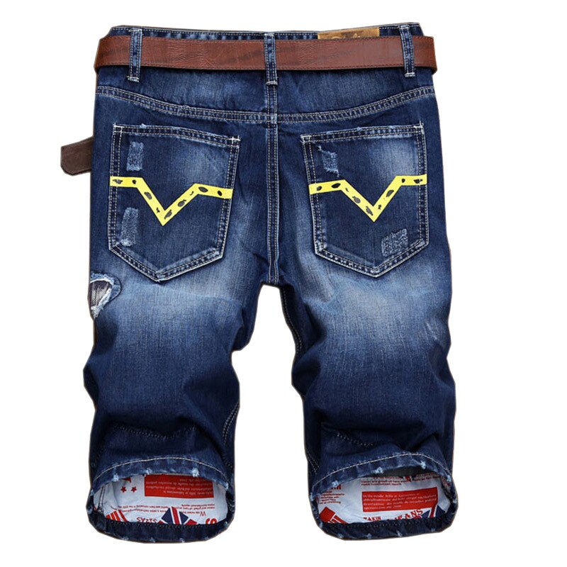 Pantaloncini di Jeans da uomo pantaloni corti al ginocchio estivi con foro rotto Jeans corti strappati da uomo blu JB13158
