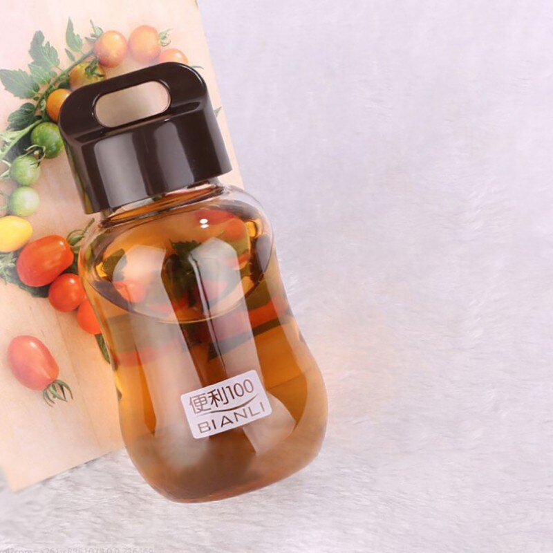 Cute cartoon small cup school supplies 180ML water bottle color plastic portable water bottle mini kettle: Brown