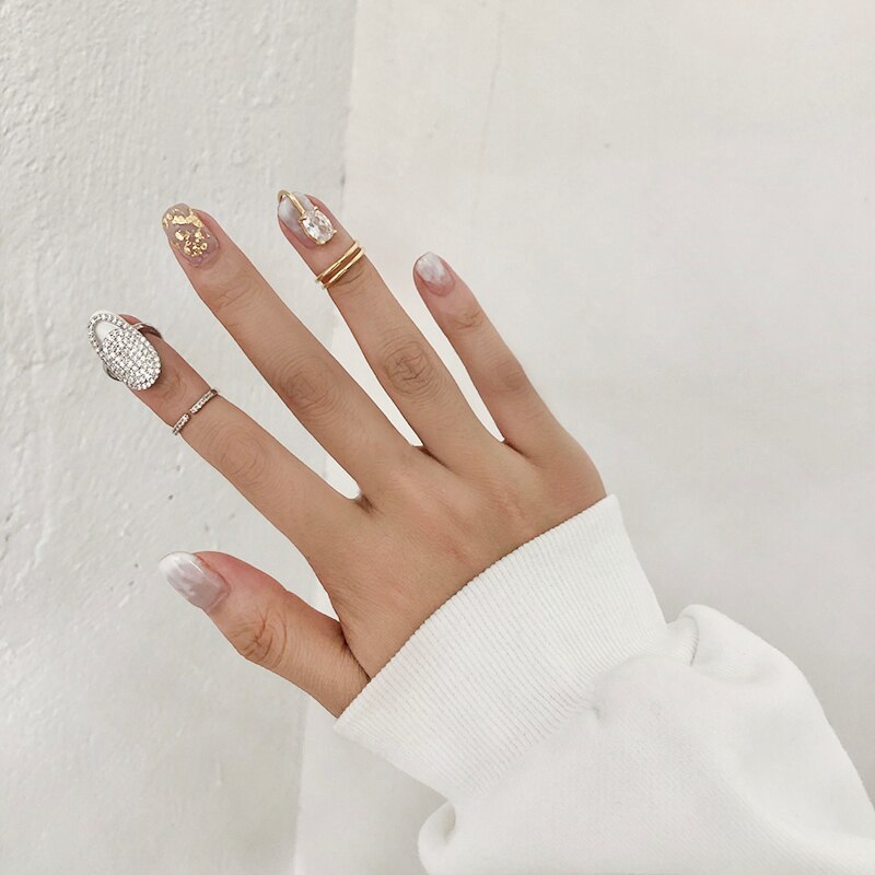 HUANZHI Neue Koreanische modisch Coole glänzend Strass Intarsien Fingerspitze Nagel Legierung ringe für Frauen Mädchen Party Zubehör