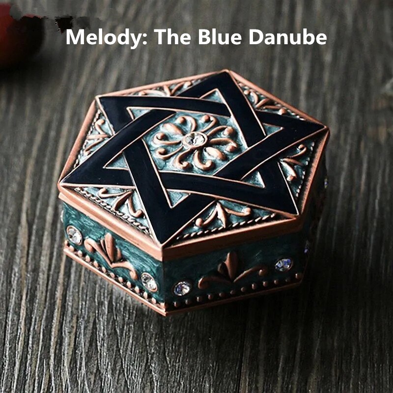 Home decoration retro piano metal music box birthday rotating music box hexagonal wedding decoration: Treasure box