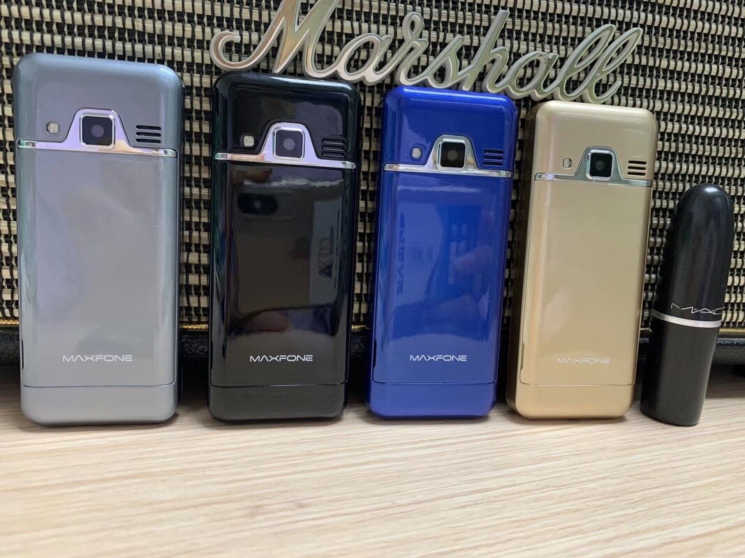 Mini-mobiel met m1 drukknoppen, 1.4 inch dual-sim, basistoetsenbord, zaklamp,  mp3 camera's, fm-radio, kleine goedkope mobiele telefoon