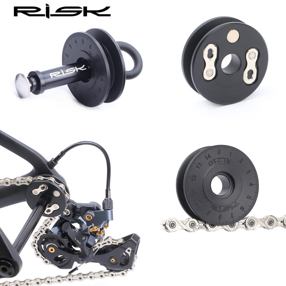RISK-certidor de cadena de bicicleta multifunción, herramienta de limpieza con esponja para engrasador de cadena, soporte para rueda de bicicleta, Protector de palanca de liberación rápida