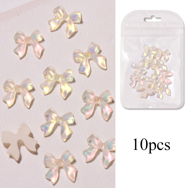 10 stk/pose blanding farger 3d nordlys sløyfer spiker rhinestones diy dekorasjon negle krystall smykker bånd sommerfugl manikyr tilbehør: Aprikos
