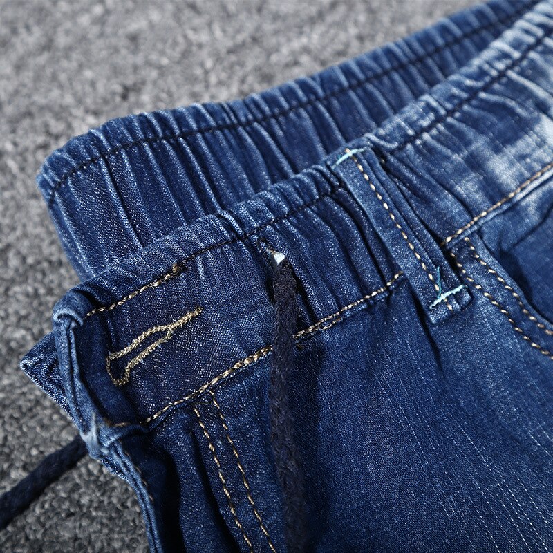 Stor størrelse 5xl 6xl 155kg denim jeans mænd shorts halv jeans løs denim afslappet flået shorts sommer hul elastik til fed broder