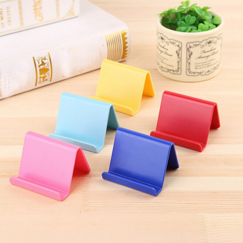 Universel couleur bonbon Support de téléphone Portable Portable Mini bureau Support Table téléphone Portable Smartphone Support couleur aléatoire