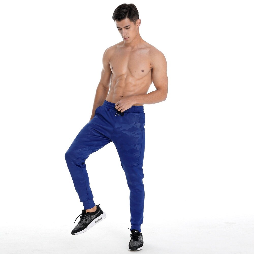 Pantaloni Casual larghi di grandi dimensioni pantaloni spessi autunno inverno da uomo stampa mimetica Bouquet piedi pantaloni sportivi pantaloni da guardia uomo Jogger