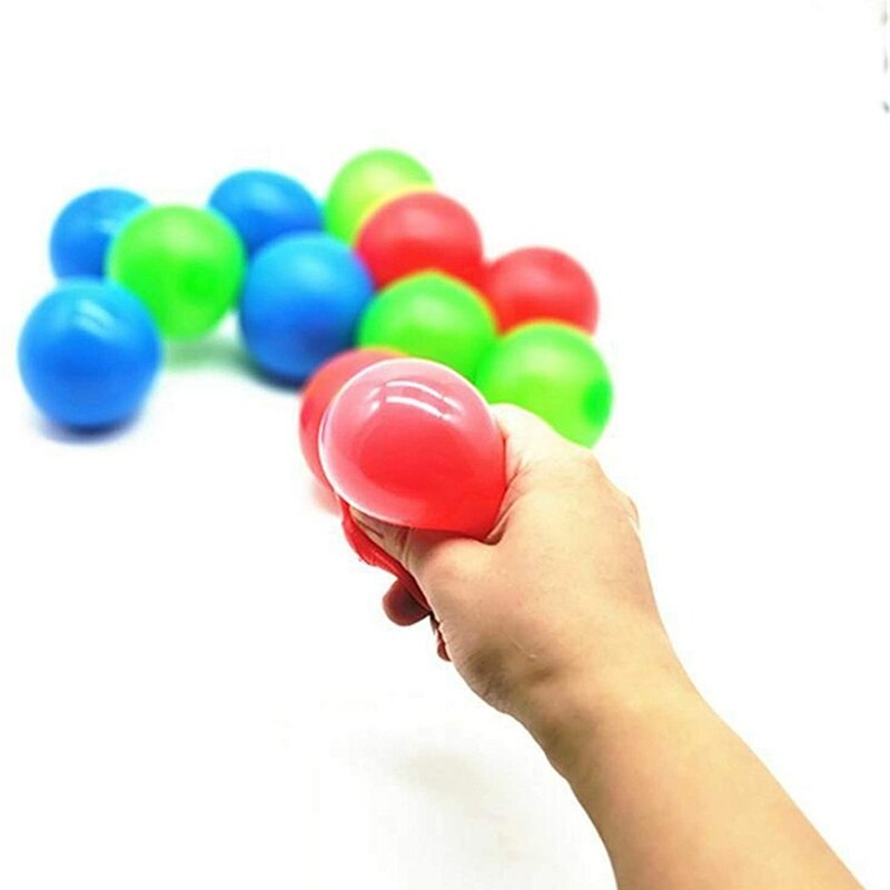 4Pcs Sticky Wall Balls Decompression Toys Glowing Balls Luminous Stress Relief Balls Sticky Ball Game Glued to Wall