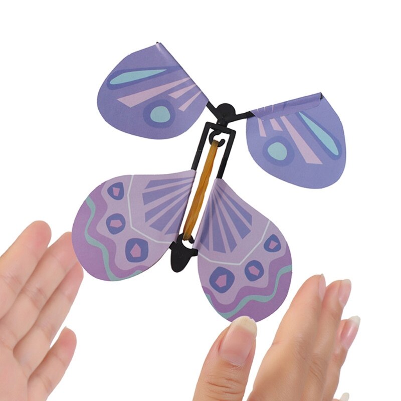 OOTDTY 10 Pcs Flying in the Book Fairy elastic Band alimentato Wind Up Butterfly Toy regali divertenti