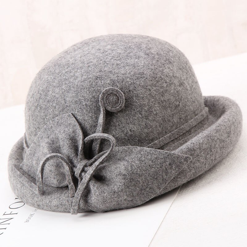 H274 jesień zima kapelusze z wełny kapelusz kobiety eleganckie moda Bowknot retro umywalka czapka panie czystego kolor wijący się kościół czapki imprezowe