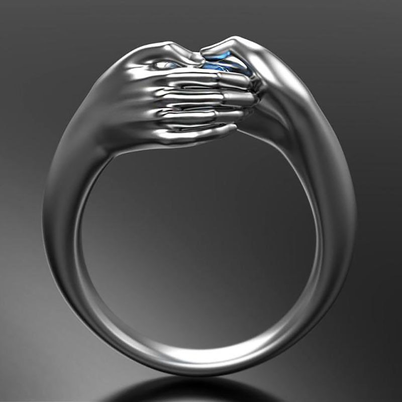 Anello di zircone di cristallo blu tenuto in mano di Design unico per le donne regalo di san valentino classico coppia abbraccio anello di fidanzamento di nozze gioielli