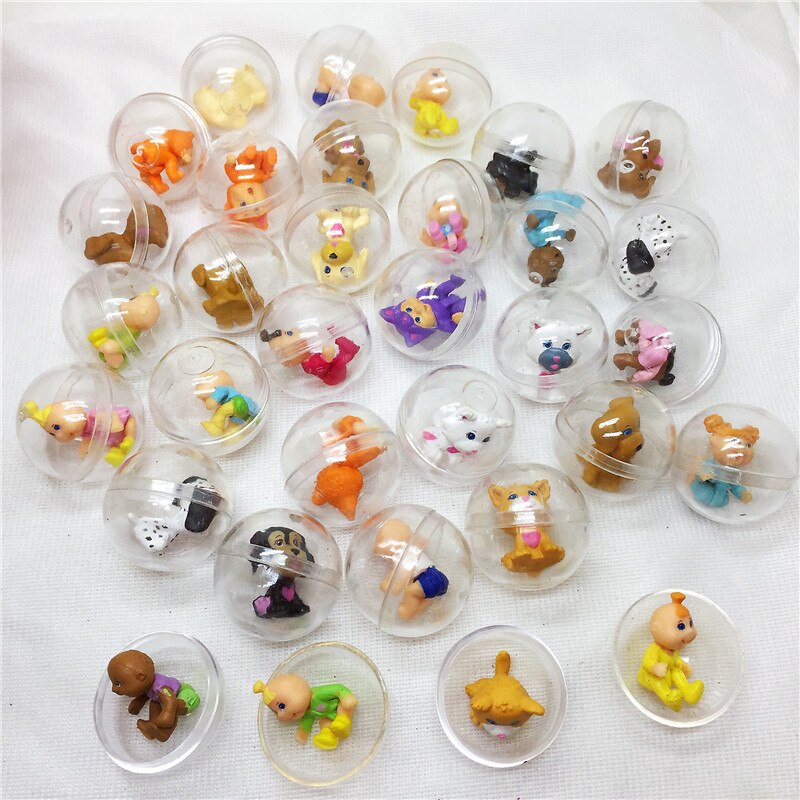 Jouet en plastique transparent de capsules de boule de diamètre de 28mm avec le jouet intérieur de petite figure envoyant aléatoirement pour le distributeur automatique