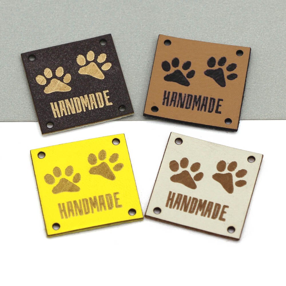 Etiquetas de cuero con huellas de animales, etiquetas hechas a mano para ropa, perro, gato, oso, pata, etiqueta hecha a mano para coser sombreros DIY, 20 piezas, 25x25mm
