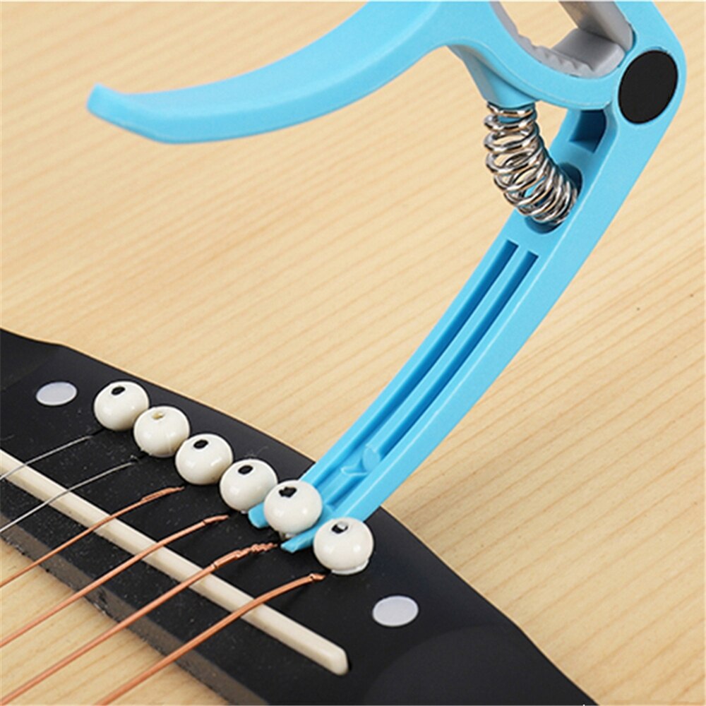 Mejor Capo para cambio de guitarra eléctrica clásica acústica abrazadera de afinación llave de plástico guitarra Capo accesorios de instrumentos musicales