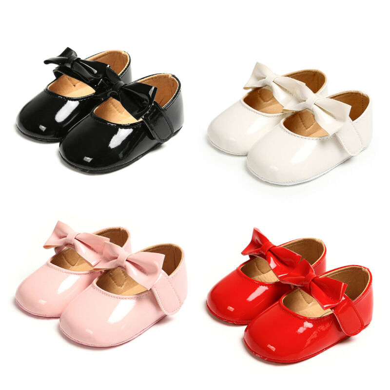 0-18Monate Kleinkind Neugeborenes Baby Krippe Kinderwagen Schuhe Bogen-Knoten Weiche Sohle Schuhe Sandalen