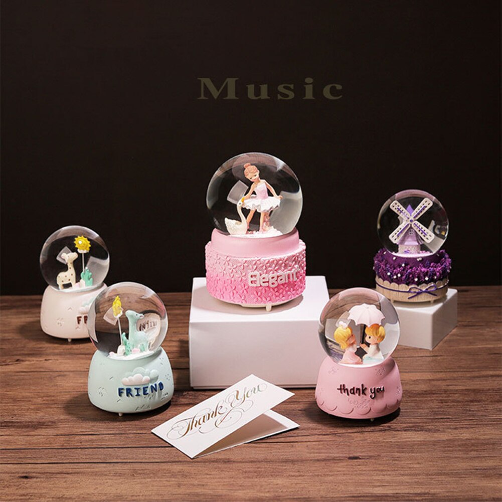 Nieve cayendo nieve caja de música de molino de viento caja de música con forma de bola de cristal con púrpura lavanda Base de escritorio decoración