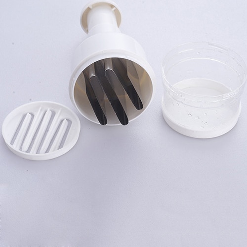 Kjøkkenpressing grønnsaksløk hvitløkhakker kutter skiver skreller skreller verktøy