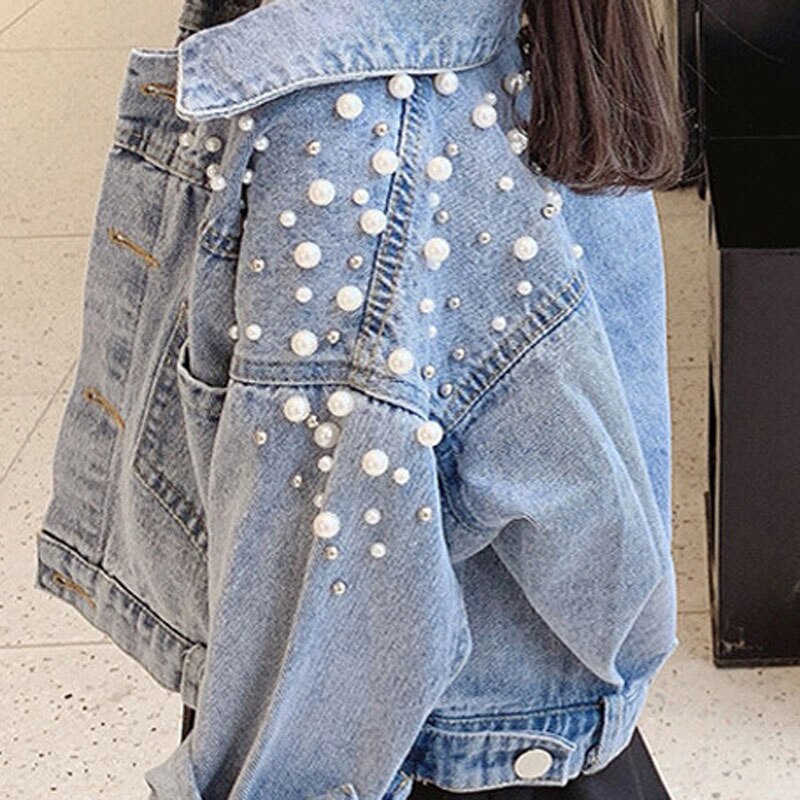 Giacca di jeans per ragazze primaverili e autunnali 2024 autunno coreano nuova giacca cardigan con bottoni superiori con risvolto dolce manica lunga allentata