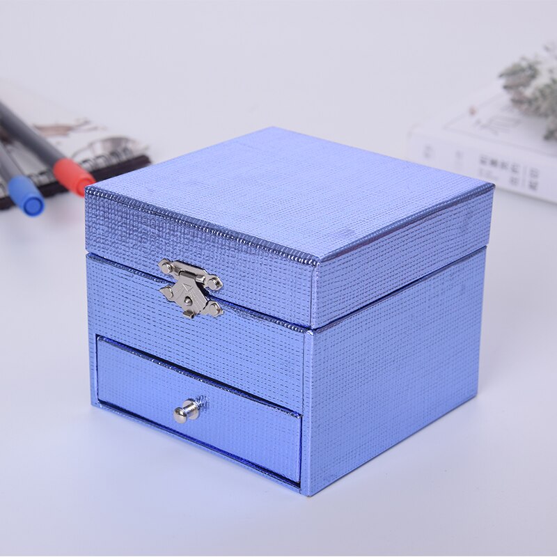 Boîte à musique en papier bleue, boîte à bijoux faite à la main carrée, boîte d'emballage, produit, proposition créative, d'anniversaire ou de noël
