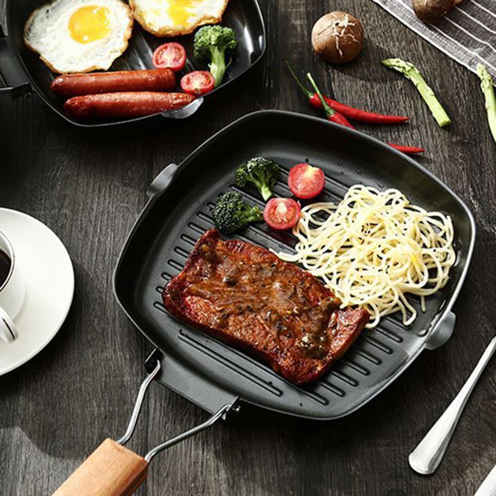 Tarttumaton paksunnettu pihvi paistinpannu taitettava raidallinen nelikulmainen uunipannu grillattu pekoni pihvi kotitalousastiat