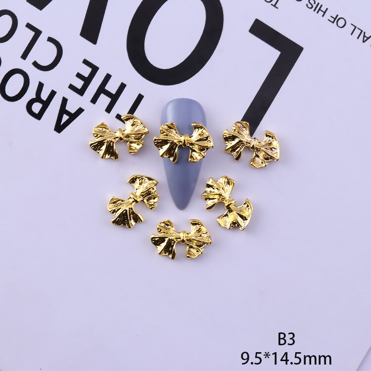 50 pezzi di ciondoli in lega d'oro e d'argento per unghie papillon farfalla 3D multi-forme accessori per unghie per ciondoli gioielli per chiodo arte giapponesi: Grigio