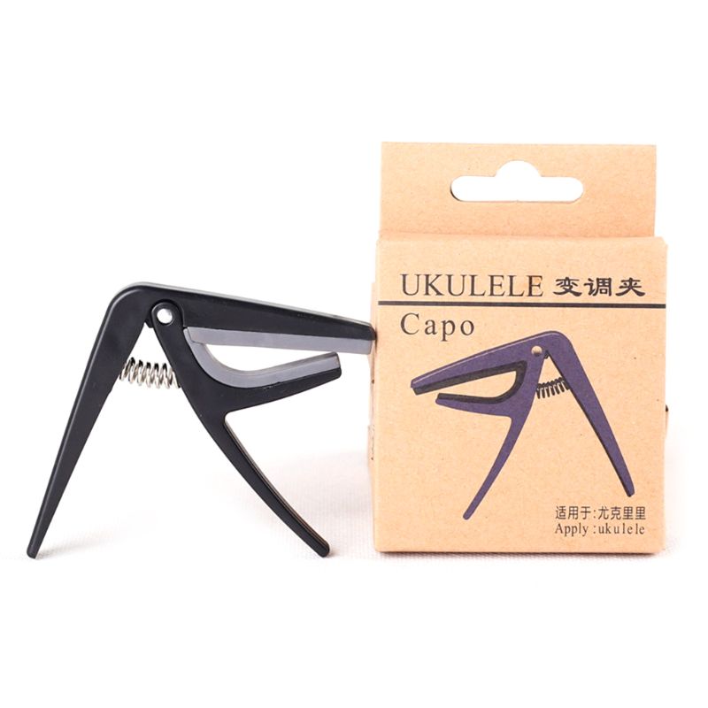 cejilla de Ukelele 4 cuerdas Capos de guitarra solo cambio rápido Ukelele Capo guitarra piezas y accesorios
