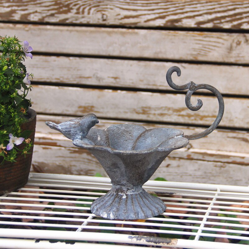 small retro rustic cast iron bird feeder