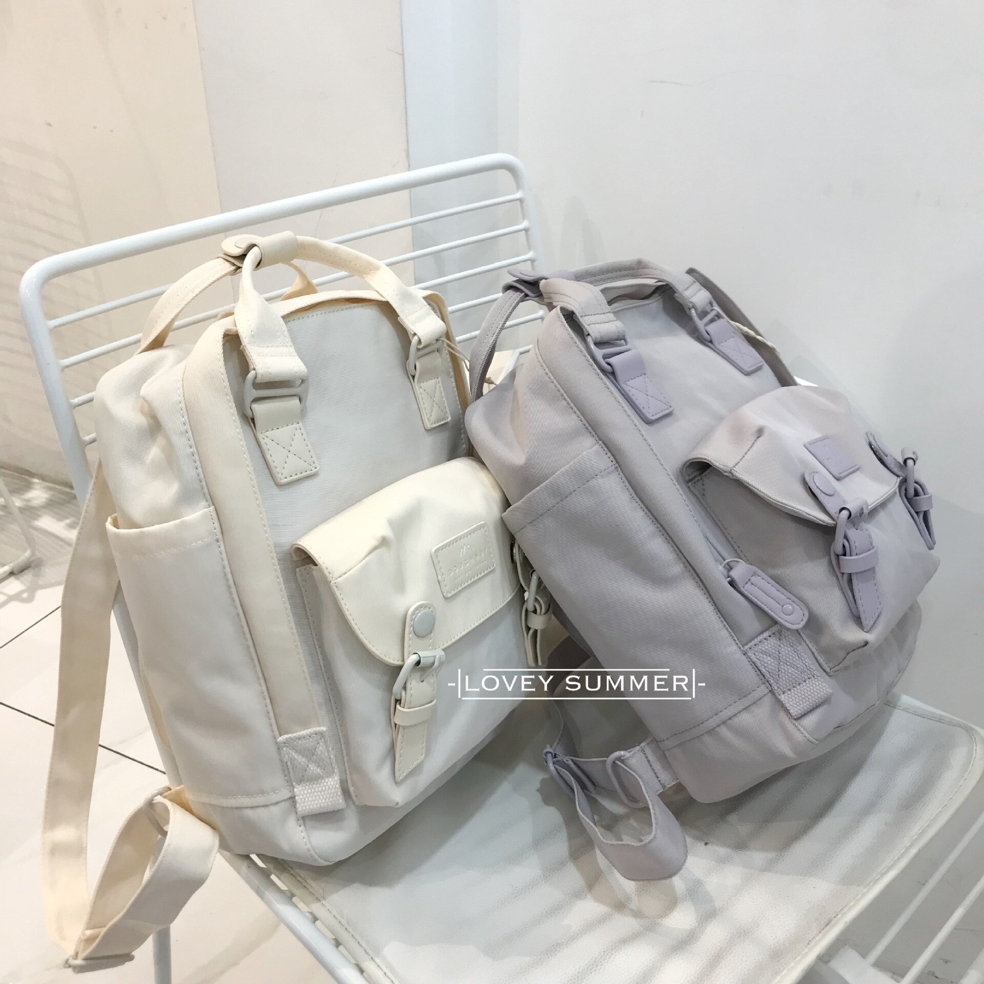 Mochila de viaje de viento de Hong Kong ins para hombres y mujeres, nueva mochila escolar de ocio de para actividades al aire libre