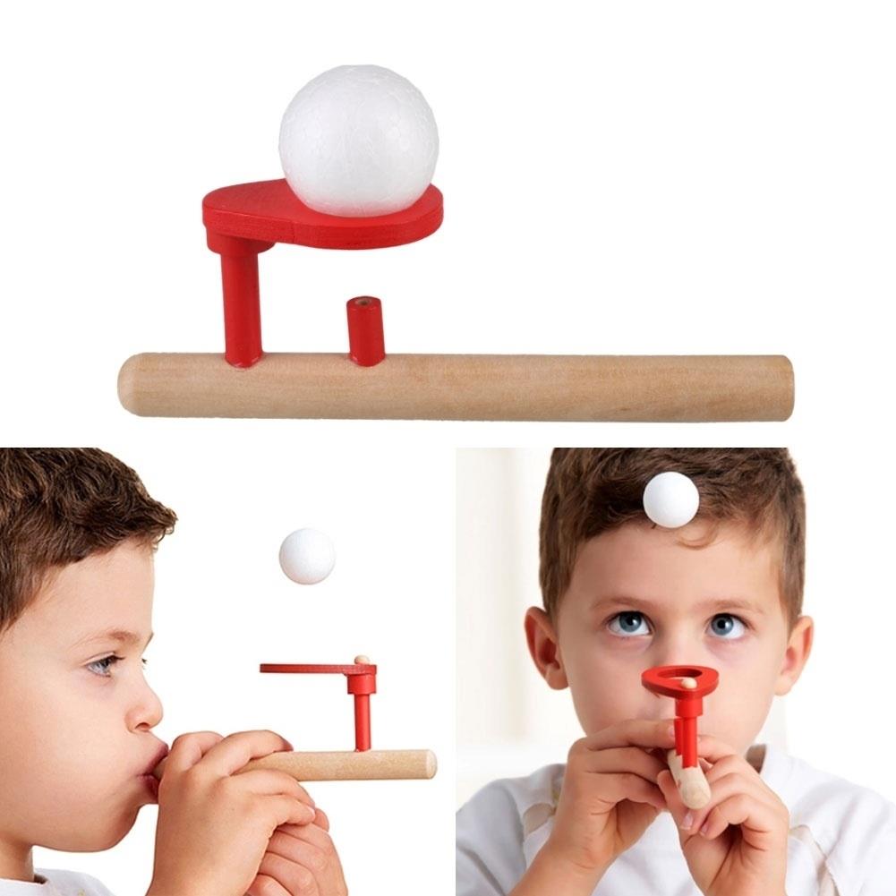 Divertido juguete que sopla el equilibrio flotante flauta bola juguete bebé Chlid jugando
