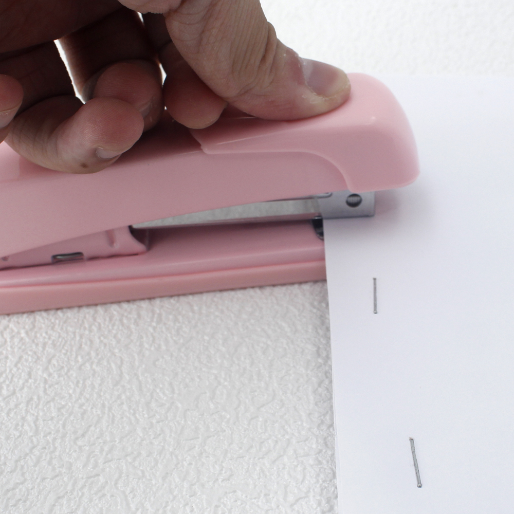 Stapler, staple remover, and staple set - a handy and stylish desktop stapler, perfect for home office use.