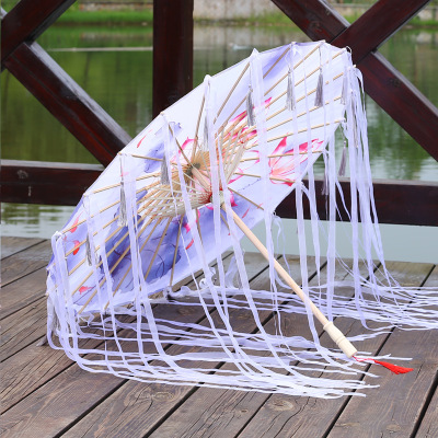 Neue erwachsene Bambus geölte Papier Regenschirm Quasten Garn Band Hanfu retro Frau Sonnenschirm Durchführung japanischen chinesischen Stil Regenschirm: Pflaume