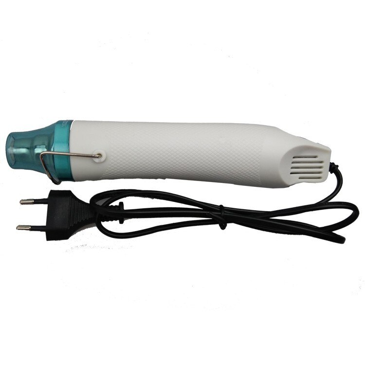 utilisation de pistolet à chaleur électrique outil électrique température de l'air avec siège de soutien rétrécissement plastique Fimo Dinks