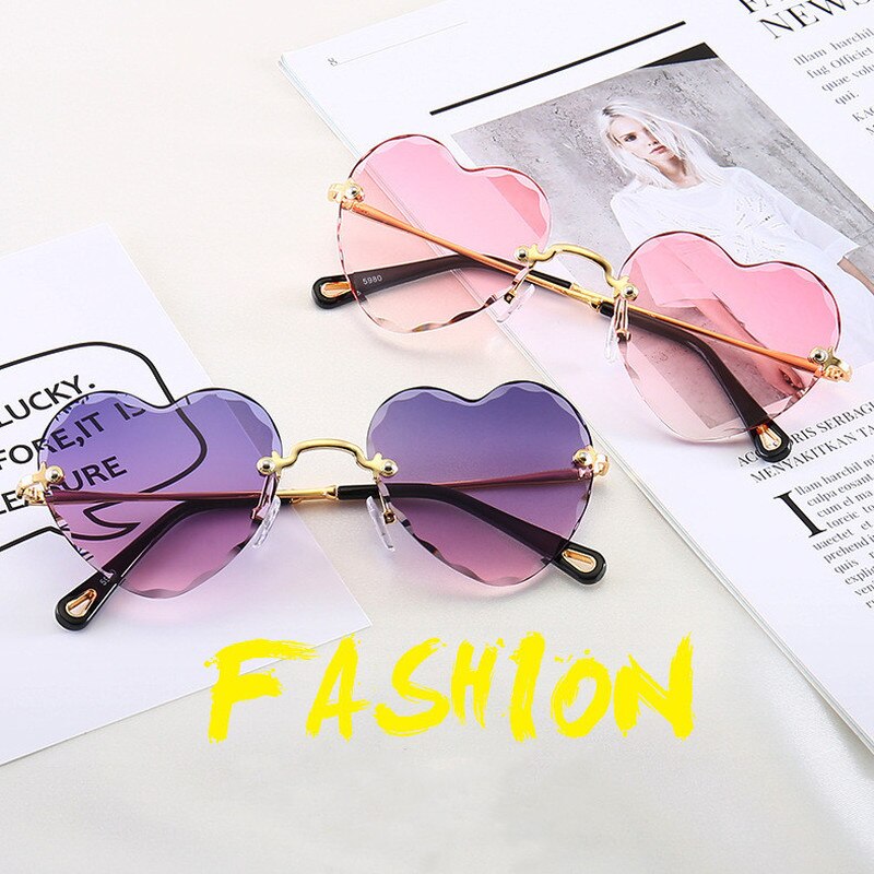 Love heart randløse solbriller kvinder luksus mærke hjerteformede drev solbriller slik farve linse plast oculos