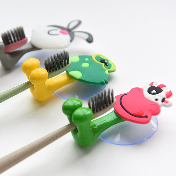 Cuidado del bebé lindo dibujo Animal forma titular ventosa ganchos de succión conjunto colgante bebé soporte para cepillo dental infantil accesorios de baño
