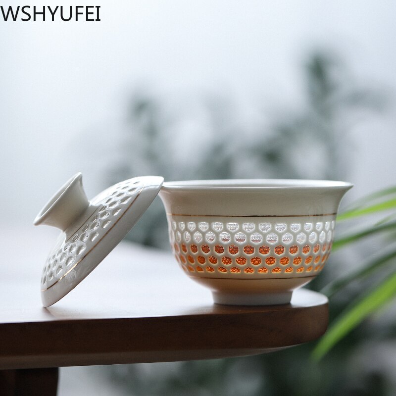 A set of white porcelain Tea set tea set home hollow hollow cellling tea set a whole set of household ceramic tea set