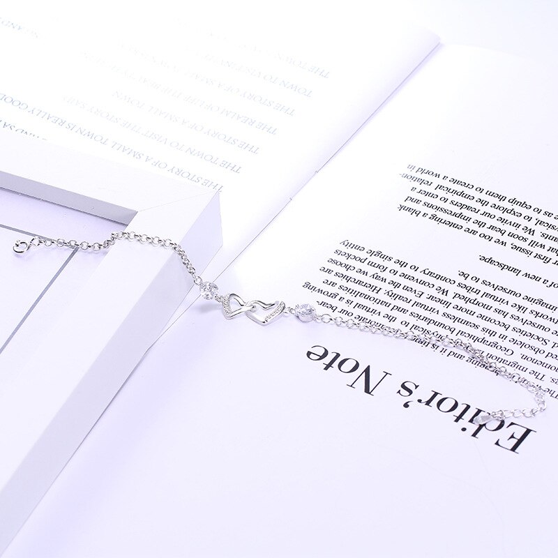 Doppio bracciale a forma di cuore con temperamento femminile del braccialetto in argento puro s925 che vende gioielli a contratto