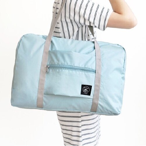 Folding Clothes Sorting Bag Luggage Storage Organizer Folding Bags Shopping Shoulder Bag Travel Accessories Women Makeup Bag: Sky blue