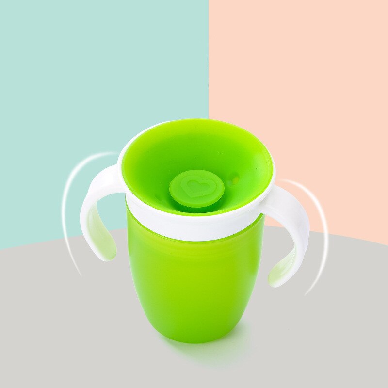 Botella de alimentación de agua mágica para niños, 360 grados, a prueba de fugas, girada, copa de plástico para beber, con tapa abatible de doble mango